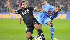 Juventus' Pirlo challenges Napoli's Behrami during their Italian Serie A soccer match at the Juventus stadium in Turin