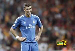 716-gareth-bale-with-his-hands-on-his-waist-in-real-madrid-2013-2014-blue-jersey-uniform-and-kit