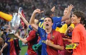 Barcelona?s midfielder Xavi celebrates w