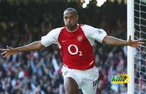 Thierry Henry of Arsenal celebrates scoring the second goal