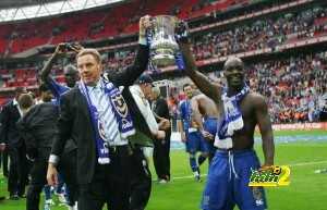 Portsmouth's Manager Harry Redknapp (L)