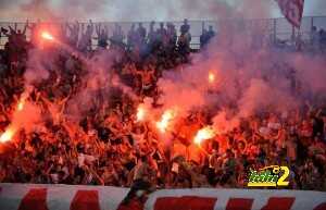 Fans of Red Star Belgrade light torches