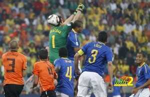 Brazil's goalkeeper Julio Cesar (top ) a