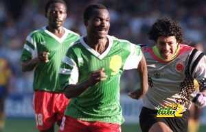 Forward Roger Milla from Cameroon runs past Colomb
