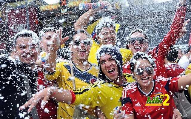 Colombian fans celebrate during the fan