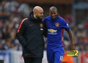 Manchester United's Ashley Young is helped off the pitch after being injured during their English Premier League soccer match against Stoke City at the Britannia Stadium in Stoke-on-Trent