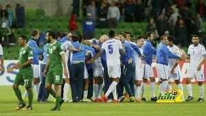 Uzbekistan's team celebrates after winning in their Asian Cup Group B soccer match against Saudi Arabia at the Rectangular stadium in Melbourne