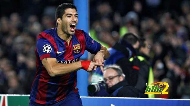 Barcelona's Uruguayan forward Luis Suarez celebrates after scoring during the UEFA Champions League Group F football match FC Barcelona vs Paris Saint-Germain at the Camp Nou stadium in Barcelona on December 10, 2014.     AFP PHOTO/ QUIQUE GARCIA        (Photo credit should read QUIQUE GARCIA/AFP/Getty Images)