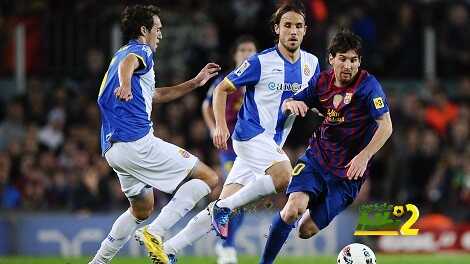 BARCELONA, SPAIN - MAY 05:  Lionel Messi of FC Barcelona duels for the ball with Raul Baena of RCD Espanyol (L) and Joan Verdu of RCD Espanyol (C) during the La Liga match between FC Barcelona and RCD Espanyol at Camp Nou on May 5, 2012 in Barcelona, Spain.  (Photo by David Ramos/Getty Images)