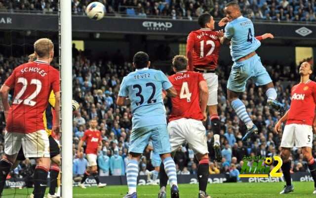 Manchester City vs Manchester United...epa03201810 Manchester City's Vincent Kompany (2-R) rises above Manchester United's Chris Smalling (3-R) to score the opening goal during the English Premier League soccer match at the Etihad Stadium, Manchester, Britain, 30 April 2012.  EPA/GERRY PENNY DataCo terms and conditions apply. http//www.epa.eu/downloads/DataCo-TCs.pdf