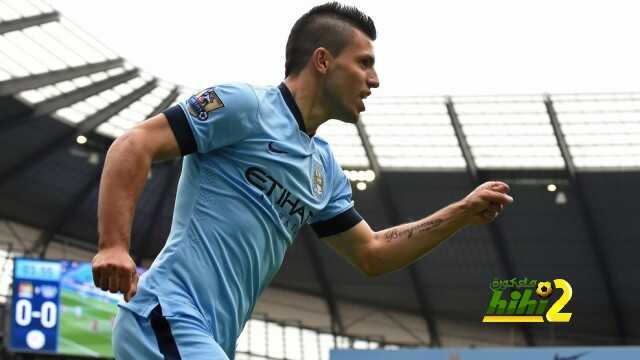 Manchester City's Argentinian striker Sergio Aguero celebrates his goal during the English Premier League football match between Manchester City and Queens Park Rangers at the Etihad Stadium in Manchester, northwest England, on May 10, 2015. AFP PHOTO / PAUL ELLIS..RESTRICTED TO EDITORIAL USE. No use with unauthorized audio, video, data, fixture lists, club/league logos or live services. Online in-match use limited to 45 images, no video emulation. No use in betting, games or single club/league/player publications. (Photo credit should read PAUL ELLIS/AFP/Getty Images)