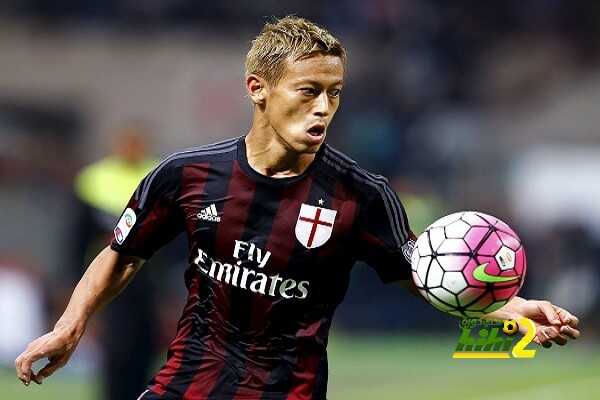 AC Milan's Honda controls a ball during the Italian Serie A soccer match against Inter Milan at the San Siro stadium in Milan