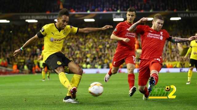 "LIVERPOOL, ENGLAND - APRIL 14: Pierre-Emerick Aubameyang of Borussia Dortmund is challenged by Alberto Moreno of Liverpool during the UEFA Europa League quarter final, second leg match between Liverpool and Borussia Dortmund at Anfield on April 14, 2016 in Liverpool, United Kingdom. (Photo by Clive Brunskill/Getty Images)"