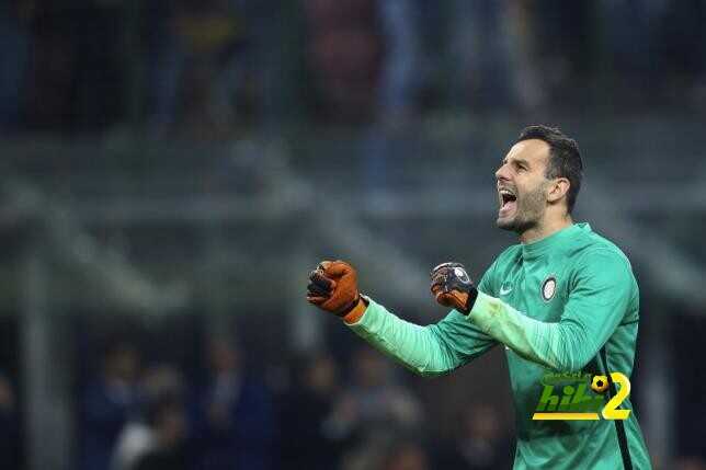 Inter Milan's goalkeeper Handanovic celebrates at the end of their Italian Serie A soccer match against AS Roma at the San Siro stadium in Milan