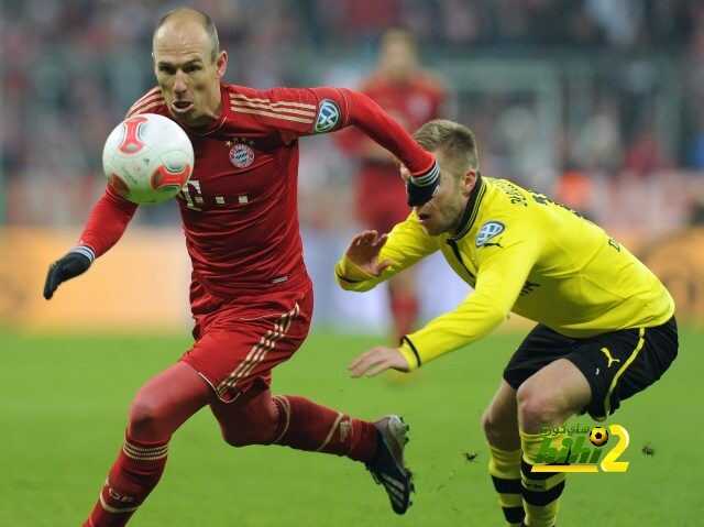 Bayern Munich's Dutch midfielder Arjen Robben (L) and Dortmund's midfielder Marco Reus vie for the ball during the German Cup quarter-final football match FC Bayern Munich vs Borussia Dortmund in Munich, southern Germany, on February 27, 2013. Bayern Munich won the match 1-0.  AFP PHOTO / CHRISTOF STACHERESTRICTIONS / EMBARGO - DFL LIMITS THE USE OF IMAGES ON THE INTERNET TO 15 PICTURES (NO VIDEO-LIKE SEQUENCES) DURING THE MATCH AND PROHIBITS MOBILE (MMS) USE DURING AND FOR FURTHER TWO HOURS AFTER THE MATCH. FOR MORE INFORMATION CONTACT DFL.        (Photo credit should read CHRISTOF STACHE/AFP/Getty Images)