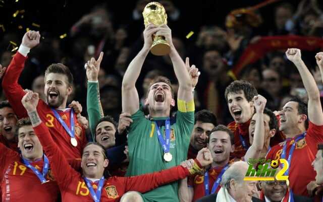 Spain goalkeeper Iker Casillas holds up the World Cup trophy after the World Cup final soccer match between the Netherlands and Spain at Soccer City in Johannesburg, South Africa, Sunday, July 11, 2010. Spain won 1-0. (AP Photo/Martin Meissner)