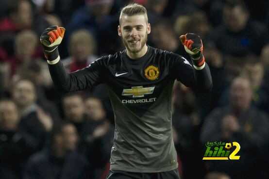 Manchester United goalkeeper David De Gea celebrates after his team's 2-1 win during the English Premier League soccer match between Manchester United and Stoke City at Old Trafford Stadium, Manchester, England, Tuesday Dec. 2, 2014. De Gea made two late saves to help his team secure the win. (AP Photo/Jon Super)