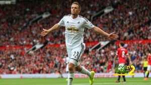 MANCHESTER, ENGLAND - AUGUST 16:  Gylfi Sigurdsson of Swansea City celebrates scoring his team's second goal during the Barclays Premier League match between Manchester United and Swansea City at Old Trafford on August 16, 2014 in Manchester, England.  (Photo by Alex Livesey/Getty Images)