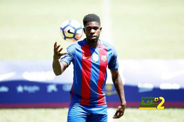 FC Barcelona's newly signed soccer player Samuel Umtiti plays with a ball during his presentation at Camp Nou stadium in Barcelona, Spain, July 15, 2016. REUTERS/Albert Gea