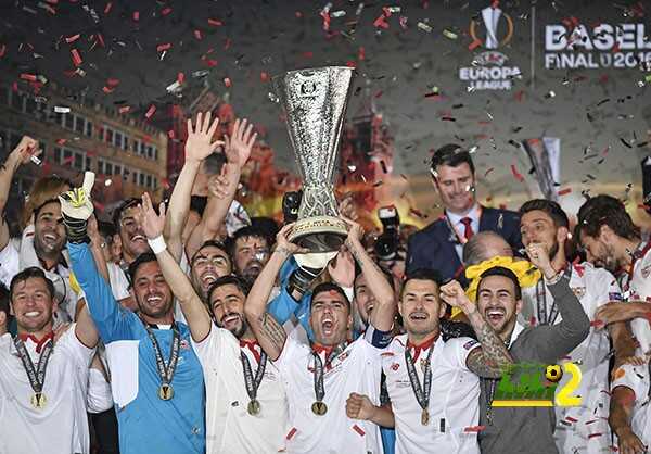 Sevilla players celebrate with the trophy after winning the Europa League final soccer match between Liverpool and Sevilla in Basel, Switzerland, Wednesday, May 18, 2016. Sevilla won the match 3-1. (AP Photo/Martin Meissner)