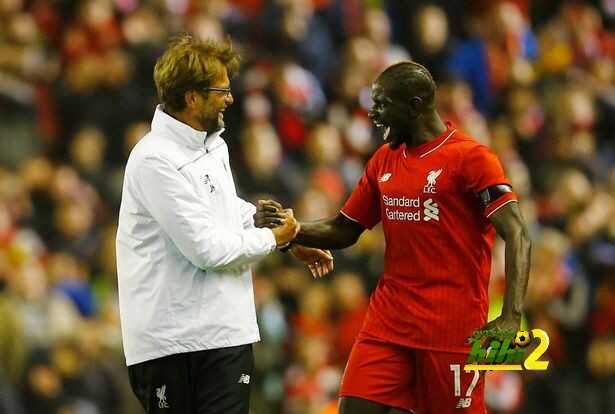 liverpools-mamadou-sakho-and-manager-juergen-klopp-celebrate-after-winning-the-match