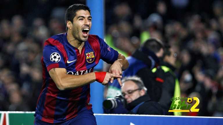 Barcelona's Uruguayan forward Luis Suarez celebrates after scoring during the UEFA Champions League Group F football match FC Barcelona vs Paris Saint-Germain at the Camp Nou stadium in Barcelona on December 10, 2014. AFP PHOTO/ QUIQUE GARCIA (Photo credit should read QUIQUE GARCIA/AFP/Getty Images)