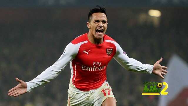 LONDON, ENGLAND - NOVEMBER 26: Alexis Sanchez of Arsenal celebrates after scoring his team's second goal during the UEFA Champions League Group D match between Arsenal and Borussia Dortmund at the Emirates Stadium on November 26, 2014 in London, United Kingdom. (Photo by Jamie McDonald/Getty Images)
